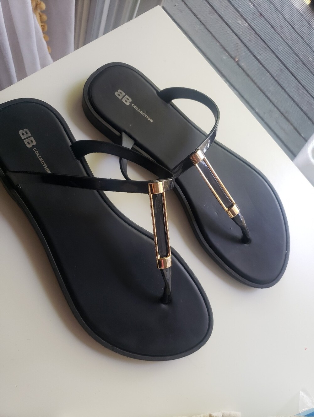 Black T-Strap Women's Sandals with Gold Accent